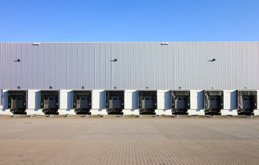 Large warehouse exterior with gates for dispatching goods
