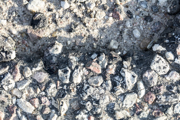 chipped asphalt road as a background 