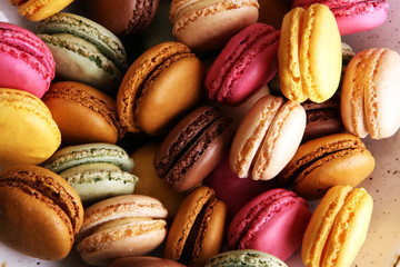 Sweet and colourful french macaroons or macaron on white background, Dessert.