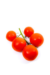 Bunch of red tomatoes on white background