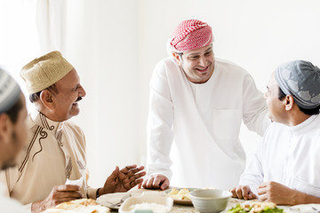 Muslim men celebrating ending of Ramadan