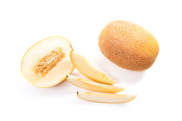 Whole, half and sliced honeydew melon tropical fruit isolated on a white background.