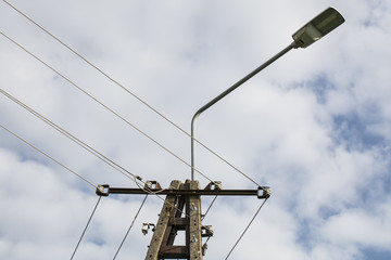 pole with electric cables and lighting