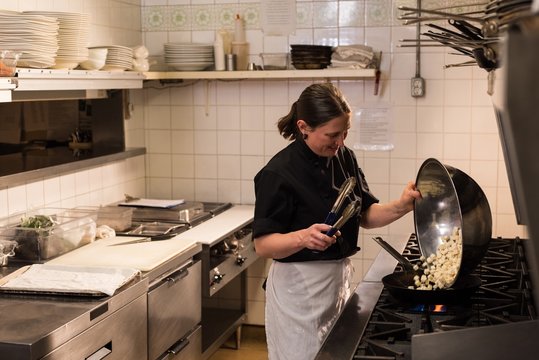 Chef cooking in kitchen