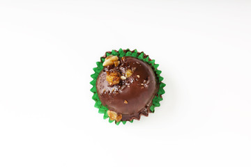 Chocolate candy on white background from top