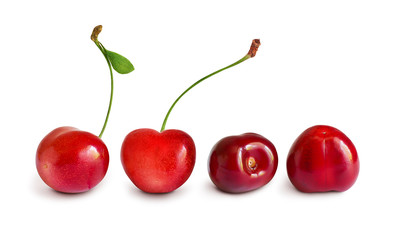 Collection of four cherries isolated on white background. Set with summer berries in different angles