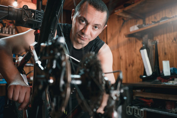 Fototapeta na wymiar bicycle mechanic. repairing.