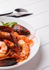 Delicious seafood pasta with shrimps and mussels