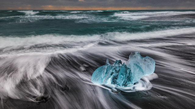 Iceland Jokulsarlon ice beach at sunrise slow clines and ice rose