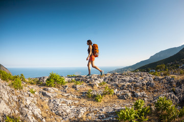 Girl at the top of the mountain.