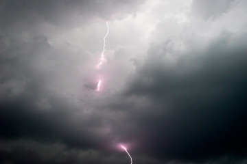 Fototapeta na wymiar Purple Lightning In Cloud