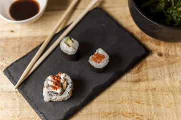 Fototapeta na wymiar Rustic table sushi food