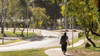 Muslim Girl Walking