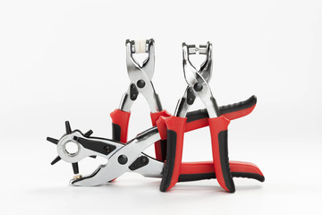 Multiple revolving and eyelet plier for punch  diameters puncher on white backgroung
