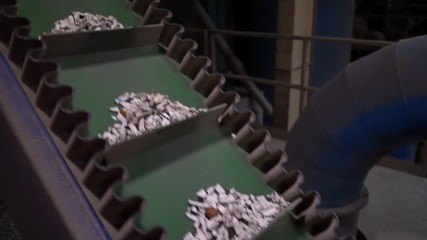 Band conveyer. Conveyor belt. Transportation of granulated raw materials to the warehouse, granulated raw materials, white, movement on the conveyor, indoors, Conveyer line