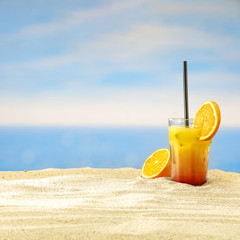 Summer drink on beach and free space for your decoration. 