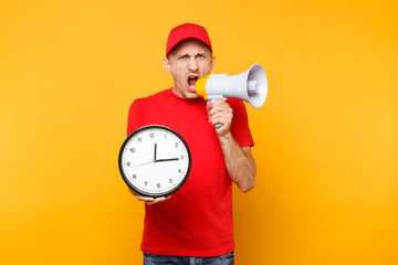 Delivery service man in red uniform isolated on yellow background. Male employee courier in cap,...