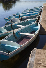 Ruderboote Welsh Crannóg Centre am Llangors Lake
