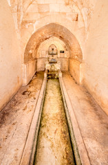 Fototapeta na wymiar View of fountain for ablution in courtyard of Abdullatif Mosque