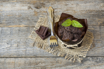 Chocolate mint cake on wooden background. Copy space