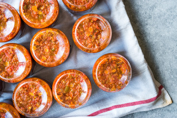 Homemade Preserved Tomato Paste Sauce in Glass Jar.