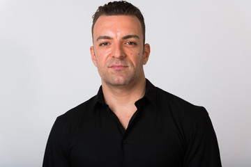 Portrait Of Handsome Businessman Against White Background