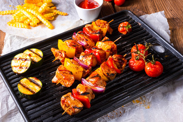 Rustic shish kebab skewers with marinated ham meat paprika and red onion