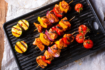 Rustic shish kebab skewers with marinated ham meat paprika and red onion