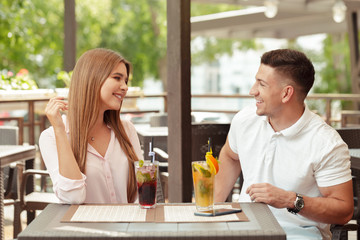 Two people in cafe enjoying the time spending with each other