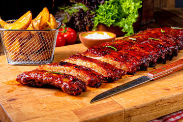 BBQ spare ribs from a charcoal grill