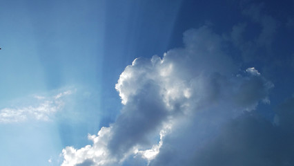Beautiful sun rays behind the clouds.Scenic view.