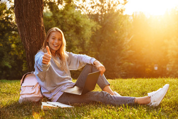 Portrait of a lovely young girl with backpack