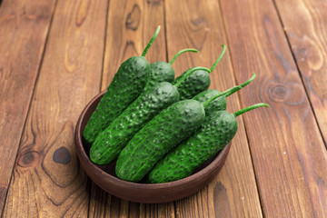 Cucumber on wooden background