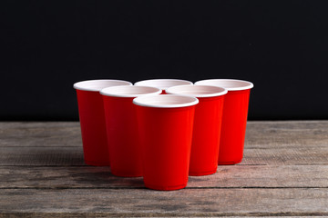 Game Beer Pong on wooden table