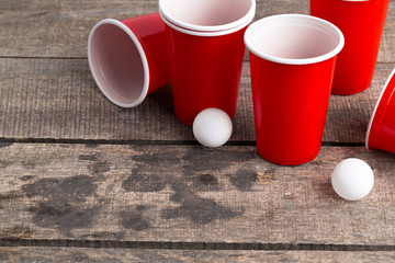 Game Beer Pong on wooden table