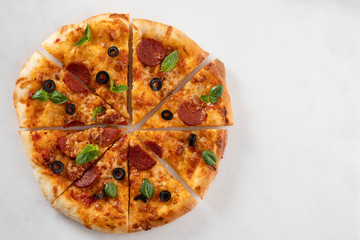 Pepperoni pizza on a white background. Copy space.