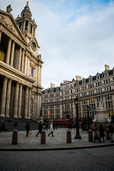 An old church or buiilding in London, England on a cold day with a grey sky with clouds