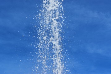 Obraz na płótnie Canvas spouting water fall from a fountain