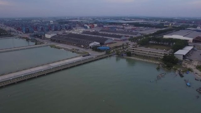 Drone shot of lorry leaving shipping port