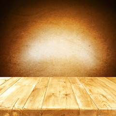 Desk of free space and dark brown wall space 