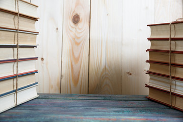 group of colorful books on the wooden table