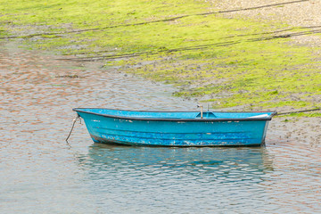 wooden fishing boat anchored
