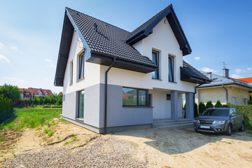 Newly built house with a finished plaster and paint