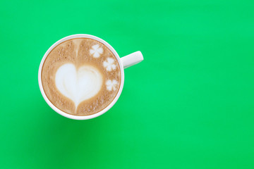 Hot Coffee Latte Art Heart on color background.