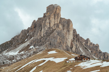 A small wooden hut house in mountains