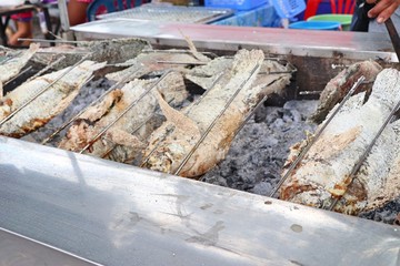 Fototapeta na wymiar Fish grilled salt at street food