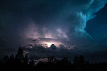 Thunderstorm Clouds with Lightning at the evening