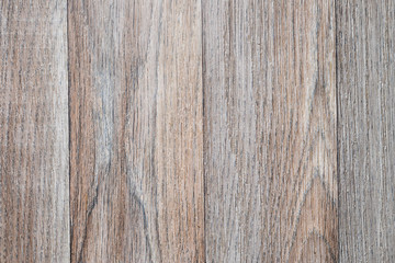 Close up photo of textured wood flooring with brown, silver, beige and ash tones.