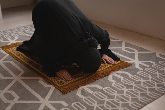 Muslim woman praying salah