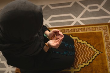 Muslim woman praying salah